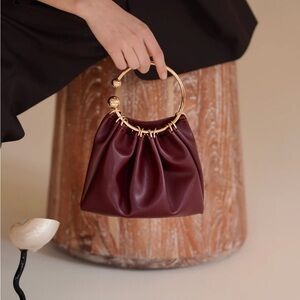 Chic Burgundy Mini Bag with Gold Handle